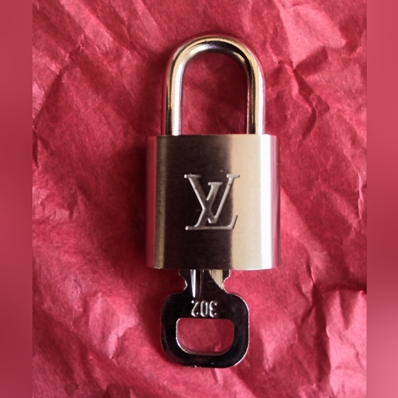 Louis Vuitton Accessories - Louis Vuitton silver lock and key #302